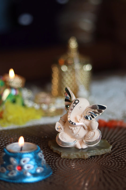 Ivory ganesha on Petrified stone